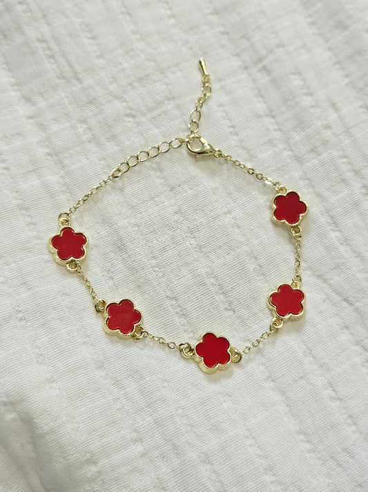 Adjustable chain bracelet whit five Red flowers.