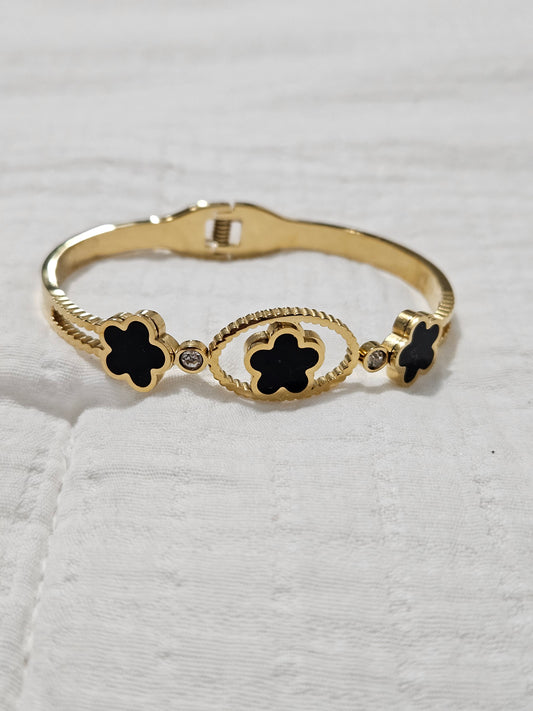 Black bracelet with three leaves